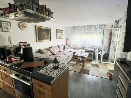Großzügiges Wohnzimmer mit offener Küche - 3 Zimmer Mehrfamilienhaus, Wohnhaus zum Kaufen in Greven