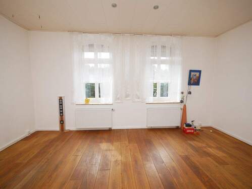Wohnzimmer - Doppelhaushälfte mit 143,00 m² in Essen zum Kaufen