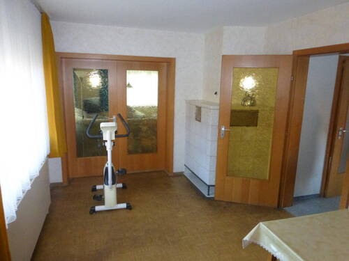 Esszimmer mit Kachelofen - 