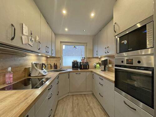 Küche - Mehrfamilienhaus, Wohnhaus mit 146,90 m&sup2; in Norderstedt zum Kaufen