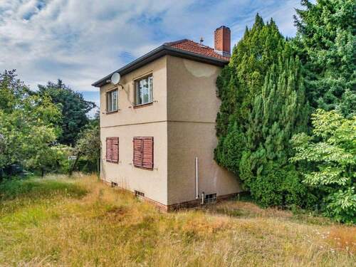 Haus seitlich - 6 Zimmer Einfamilienhaus in Berlin