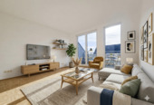 Wohnzimmer - digital gestaged - Attraktive 3-Zimmerwohnung mit zwei Balkonen und Tiefgaragenstellplatz