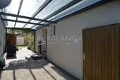 Überdachter Hofeingang mit Zugang zum Garten - Einfamilienhaus mit 170,00 m² in Budenheim zum Kaufen