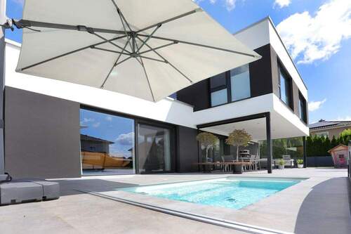 Aussenaufnahme - Einfamilienhaus mit 178,00 m² in Geisenhausen zum Kaufen