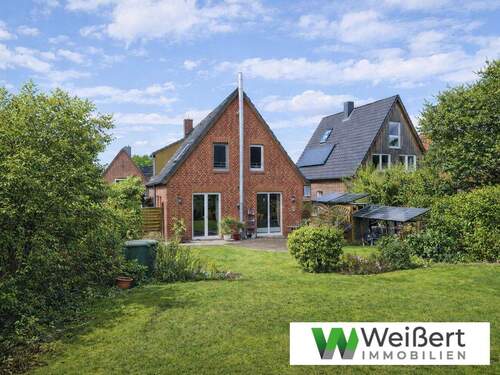 Südansicht - Großzügig wohnen in gefragter und ruhiger Lage - 6 Zimmer auf 926 m² Grundstück mit Garage