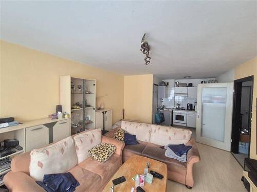Gemütliches Wohnzimmer - Etagenwohnung mit 47,00 m² in München zum Kaufen