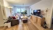 Wohnzimmer - Etagenwohnung mit 69,40 m&sup2; in Neufahrn in Niederbayern zum Kaufen
