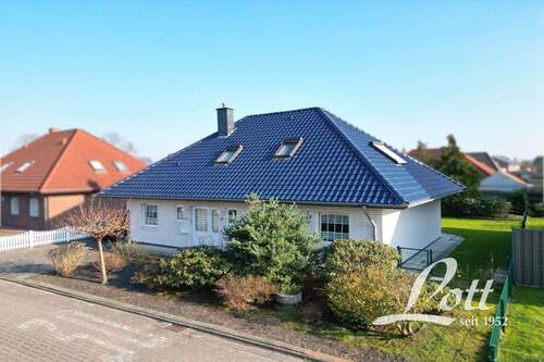 Straßenansicht - 6 Zimmer Einfamilienhaus zum Kaufen in Apen / Augustfehn