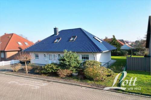 Straßenansicht - Einfamilienhaus mit 170,60 m&sup2; in Apen / Augustfehn zum Kaufen