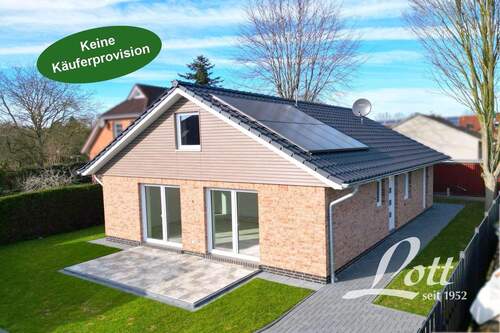 Bild 1 - +++ Erstbezug! Ebenerdiger Neubau-Bungalow mit Carport in beliebter Wohnlage von Augustfehn +++