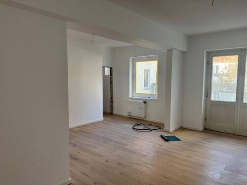 Wohnzimmer und Küche - Etagenwohnung mit 87,00 m&sup2; in Hannover zum Kaufen