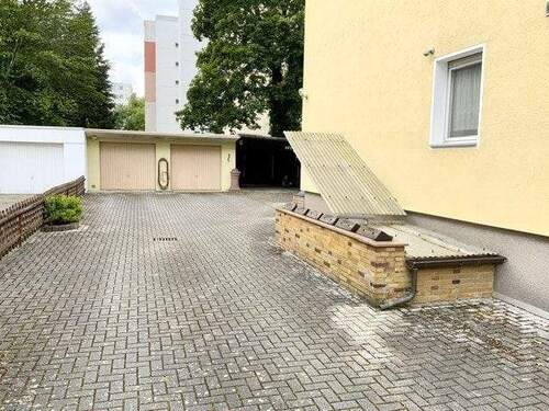 Hofeinfahrt - Mehrfamilienhaus, Wohnhaus mit 172,00 m&sup2; in Neu-Isenburg zum Kaufen