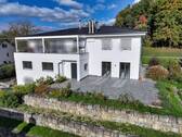 Südansicht Gesamthaus mit großer Terrasse und Gartenanteil der Wohnung - WOHNJUWEL IN UNTERUHLDINGEN AM BODENSEE