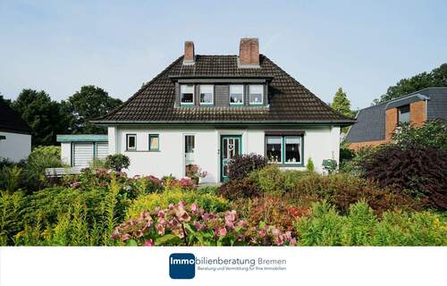 Immobilienberatung Bremen - Charmantes Einfamilienhaus auf attraktiven Hanggrundstück mit Carport