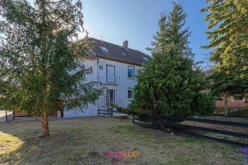 Gartenseite - 7 Zimmer Mehrfamilienhaus, Wohnhaus zum Kaufen in Seelze