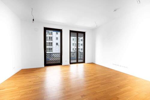 Wohnzimmer - ?? Schöne Wohnung im Schönegarten: Hochwertige 2-Zi-Neubauwohnung mit Aufzug und sonnigem Balkon