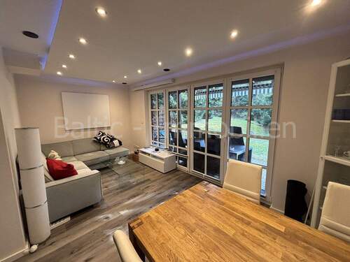 Wohnzimmer - Mehrfamilienhaus, Wohnhaus mit 80,00 m&sup2; in Scharbeutz / OT Klingberg zum Kaufen