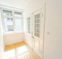 Zauberhafte Altbauwohnung mit Balkon und Gartennutzung im Herzen Lübecks