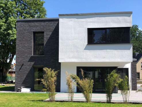 001bGartenansicht Raffstore Putz Verblend.jpg - 