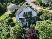 Haus und Gartenansicht - Einfamilienhaus mit 204,00 m&sup2; in Wertheim / Hofgarten zum Kaufen