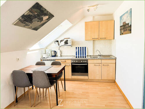 Essbereich mit Küche - Etagenwohnung mit 57,80 m&sup2; in St. Peter-Ording zum Kaufen