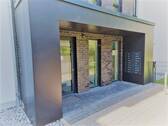 Zwei Tiefgaragenplätze (im Preis enthalten) - 