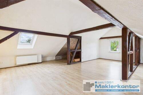 Dachgeschoss/Wohnbereich mit Kamin - 