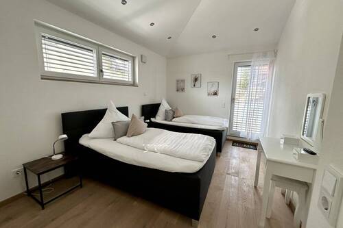 Schlafzimmer mit direktem Zugang zur Dachterrasse - 