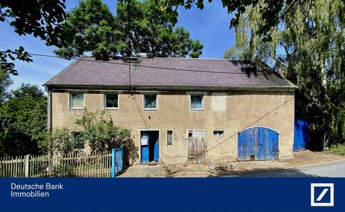 Straßenansicht - Einfamilienhaus mit separatem Acker- und Wiesengrundstück