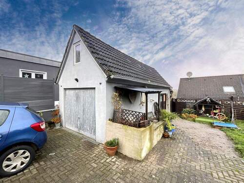Garage mit angegliedertem Abstellraum - 