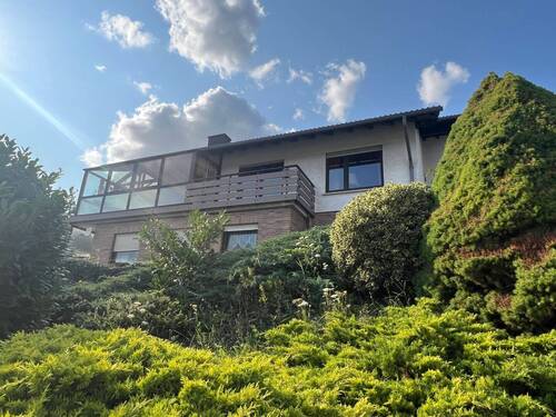 Vorderansicht - Top-Gelegenheit! Einfamilienhaus mit Einliegerwohnung in Hochstetten-Dhaun zu verkaufen.