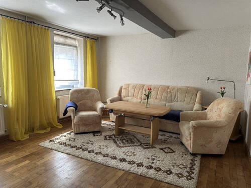 Wohnzimmer Erdgeschoss - Einfamilienhaus mit 95,90 m&sup2; in Baumholder zum Kaufen