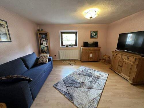 Wohn-, Schlaf-, oder Arbeitszimmer II im Souterrain - 