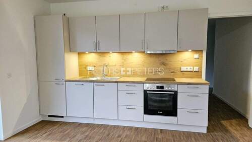 Musterküche Einbauküche - Etagenwohnung mit 76,30 m&sup2; in Pinneberg zur Miete