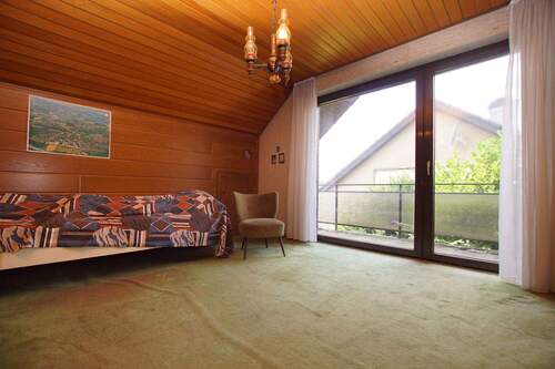 Schlafzimmer mit Balkon - 
