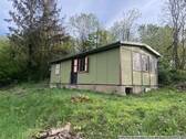 Ansicht Bungalow - 2 Zimmer Mehrfamilienhaus, Wohnhaus zum Kaufen in Meißen