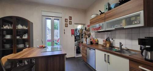 Küche mit Ausgang zum Garten - 