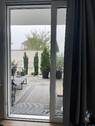 große Schiebetüre zur überdachten Terrasse - Etagenwohnung mit 107,00 m&sup2; in Bad Staffelstein zur Miete