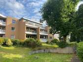 Gartenansicht - Helle 3-Zimmer-Wohnung mit Stellplatz am Hubertussee nah der Königsallee mit schönem Ausblick