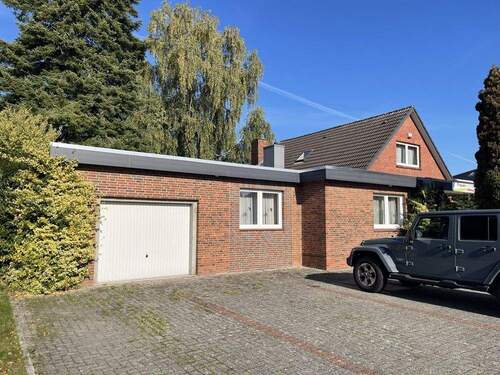 Garage - 9 Zimmer Einfamilienhaus zum Kaufen in Schortens