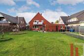 Gartenansicht - Einfamilienhaus mit 196,20 m&sup2; in Lohne zum Kaufen