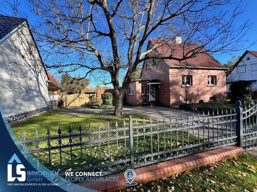 Hausansicht - Haus mit traumhaftem Grundstück direkt am Roßdorfer Kanal