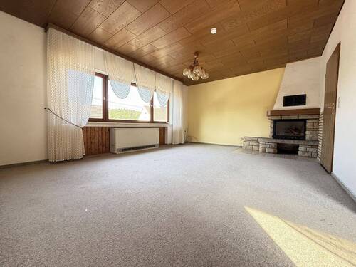 Wohnzimmer mit Kaminofen - 