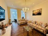 Wohnzimmer - Topsanierte und hochwertige Eigentums-Ferienwohnung mit Wintergarten in strandnaher und zentraler Lage im schönen Seebad Bansin