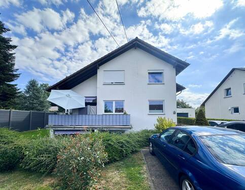 Straßenansicht - 9 Zimmer Mehrfamilienhaus, Wohnhaus zum Kaufen in Rückeroth