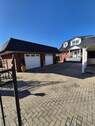 Blick auf die Doppelgarage - 6 Zimmer Einfamilienhaus zum Kaufen in Rellingen
