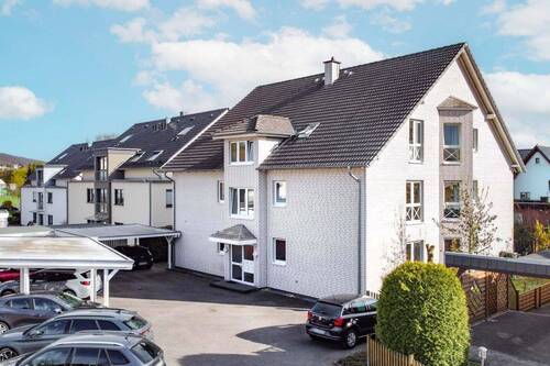 Außenansicht - Modernes Wohnen in attraktiver Lage: 3-Zimmerwohnung mit Terrasse und 2 Stellplätzen in BI-Quelle