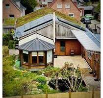 Nachhaltiger Bungalow mit Wintergarten, Garage und Garten - Krempe