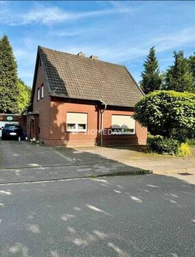 Außenansicht - Charmantes Einfamilienhaus mit Einliegerwohnung und großem Garten in ruhiger Lage