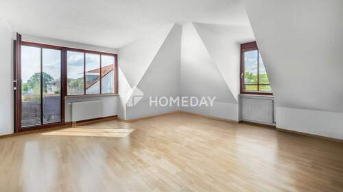 Wohnzimmer 1-1 - Lichtdurchflutete Dachgeschosswohnung mit Balkon und Tiefgaragenstellplatz in grüner & ruhiger Lage